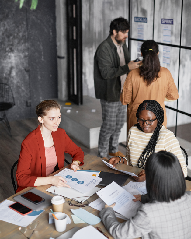 Group of people in the SEM digital marketing team working in office at Eskay Marketing.