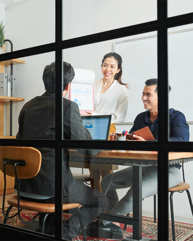 Local SEO Services Team Working in Conference Room | Eskay Marketing