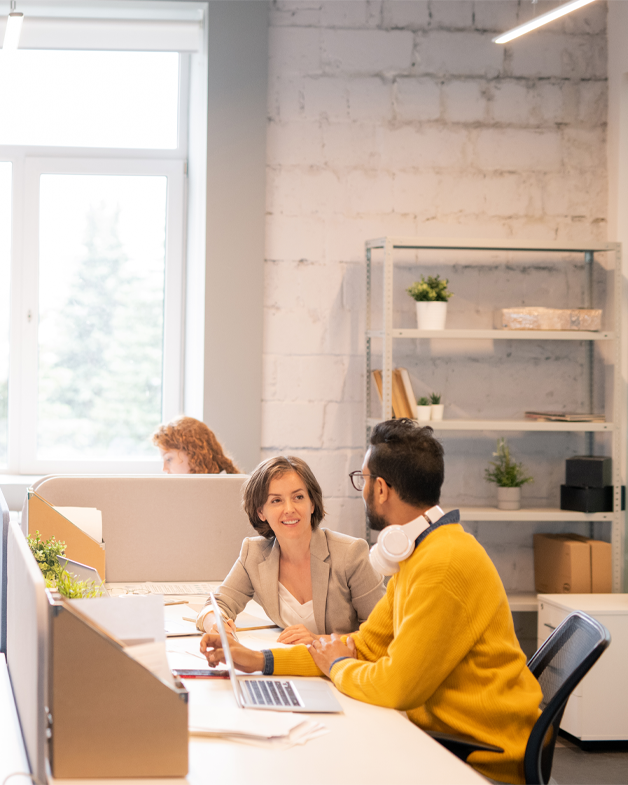 Employee of Eskay Marketing working at his desk